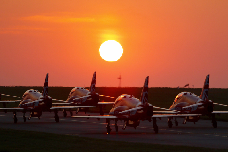 Red Arrows with sunset